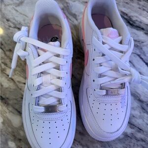 Nike Kids White Sneakers with Pink Highlights